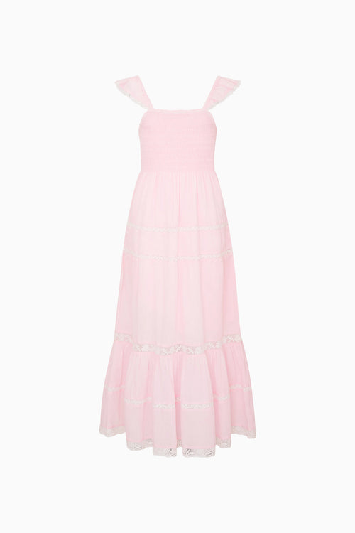 Pink dress with ruffle straps on a white background