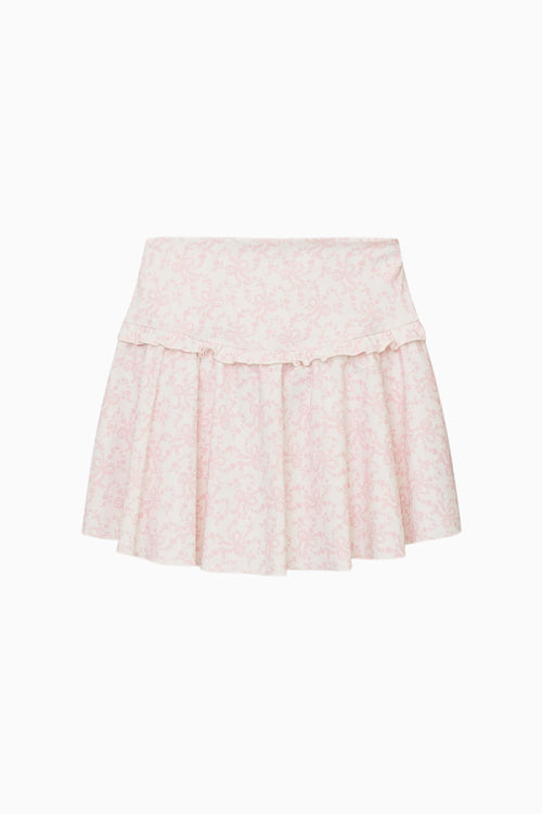 Pink skirt with lace details on a white background