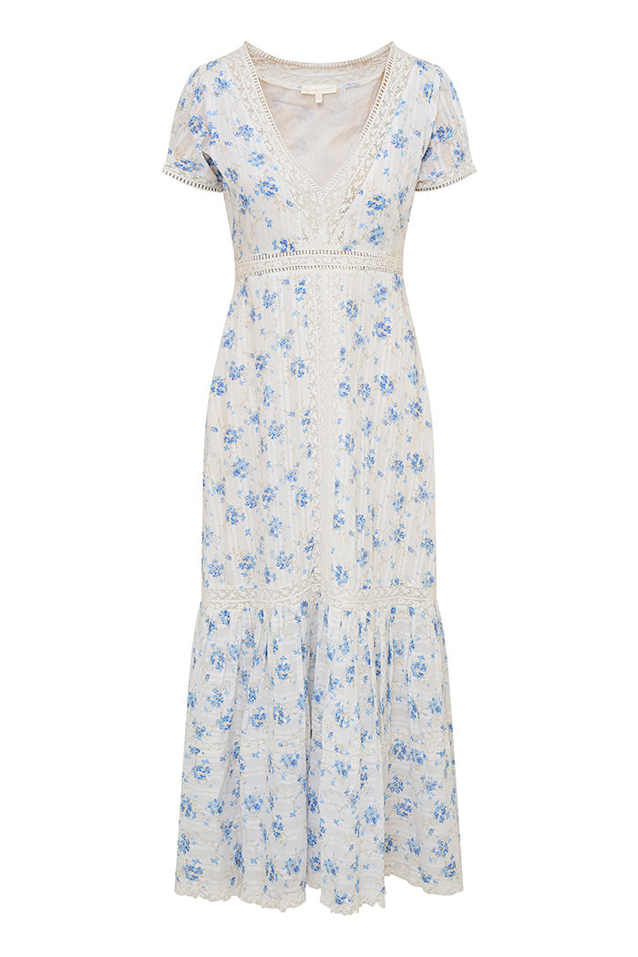 Blue floral printed midi dress featuring lace detail all over. Begins with short sleeves and a v-neckline lined with lace that descends down center front into a pleated skirt with lace insets that falls to a lace hem.