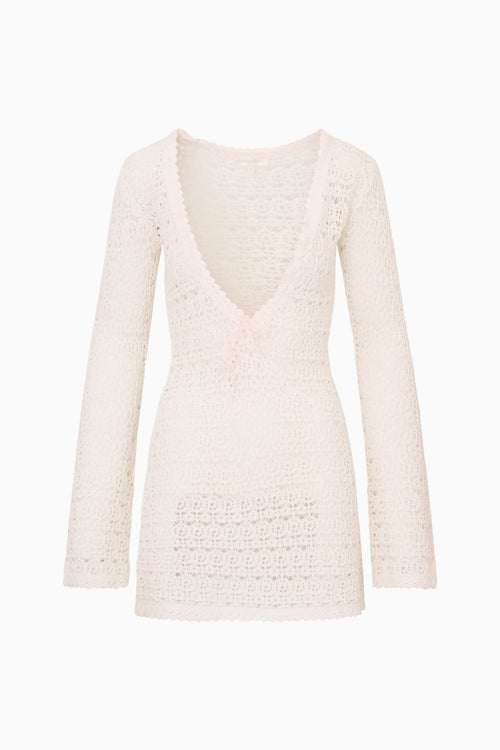 White textured long-sleeve dress on a white background