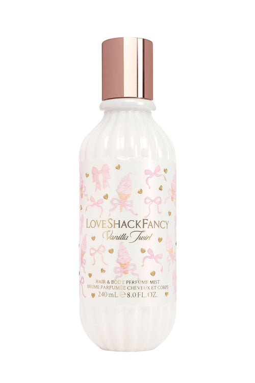 Perfume mist bottle with floral design and 'Love Shack Fancy' branding on a white background
