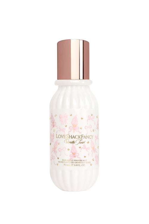 Skincare bottle with floral design and rose gold cap on a white background