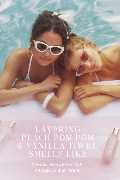 Two women lounging in a pool with text about perfume layers.