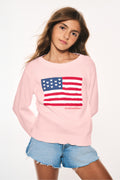 Person wearing a pink sweatshirt with an American flag design on a white background