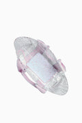 Baby bouncer with pink and white pattern on a white background