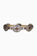Wide belt with decorative concho details on a white background
