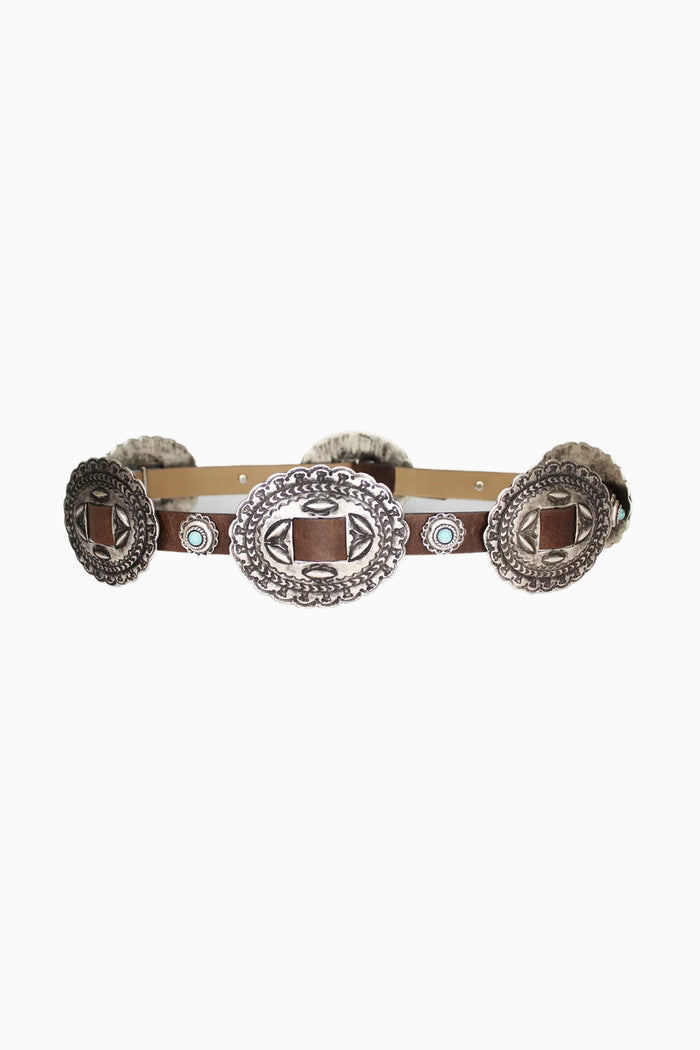 Wide belt with decorative concho details on a white background