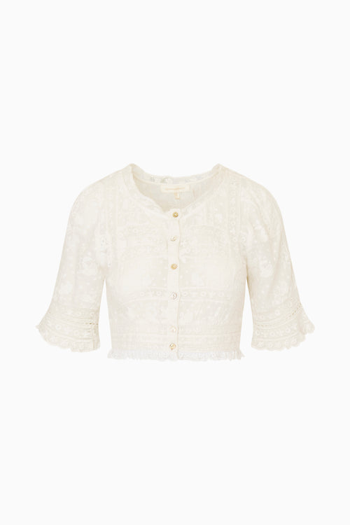 White lace cropped top with mid length sleeves on a white background