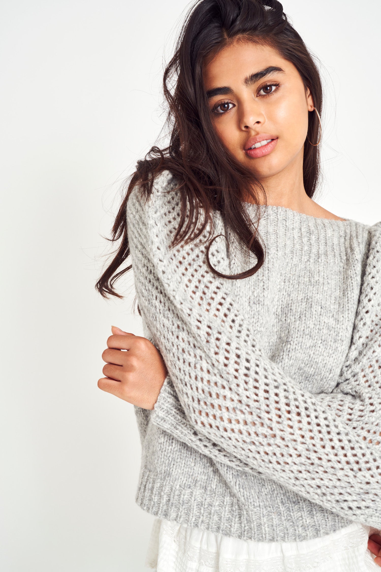 The Rosie pullover is made from baby alpaca while being extremely light and full with a chunky look. It has a straight rib neckline and a straight body with rib finishing. It is an open knit weave with a puffy shoulder that slims out at the bottom.