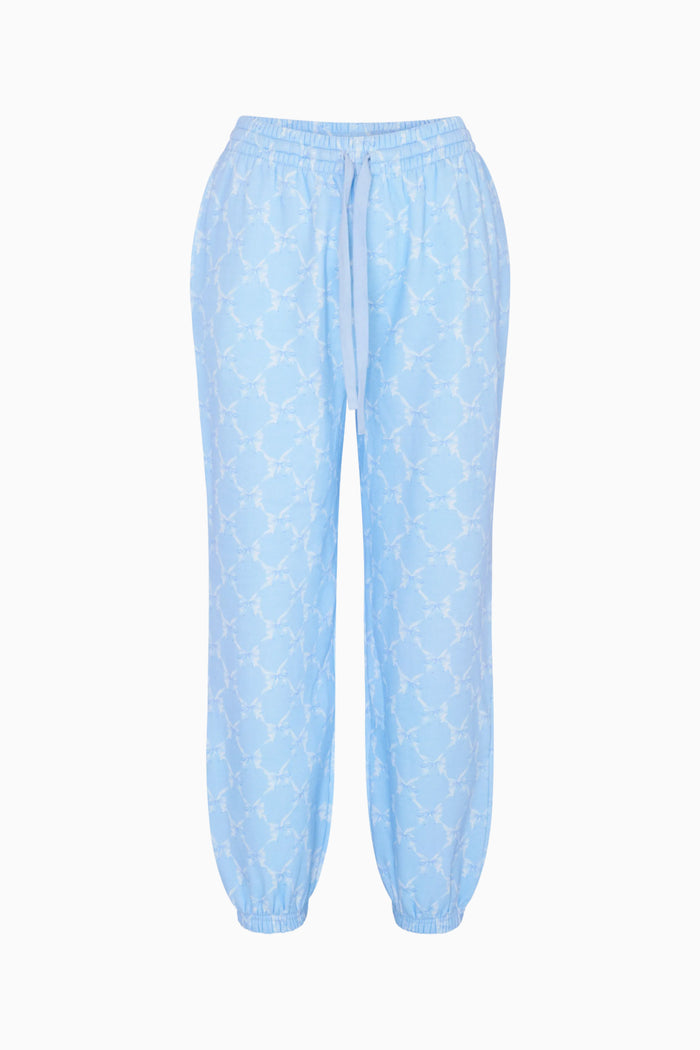 Light blue pants with a subtle pattern on a white background