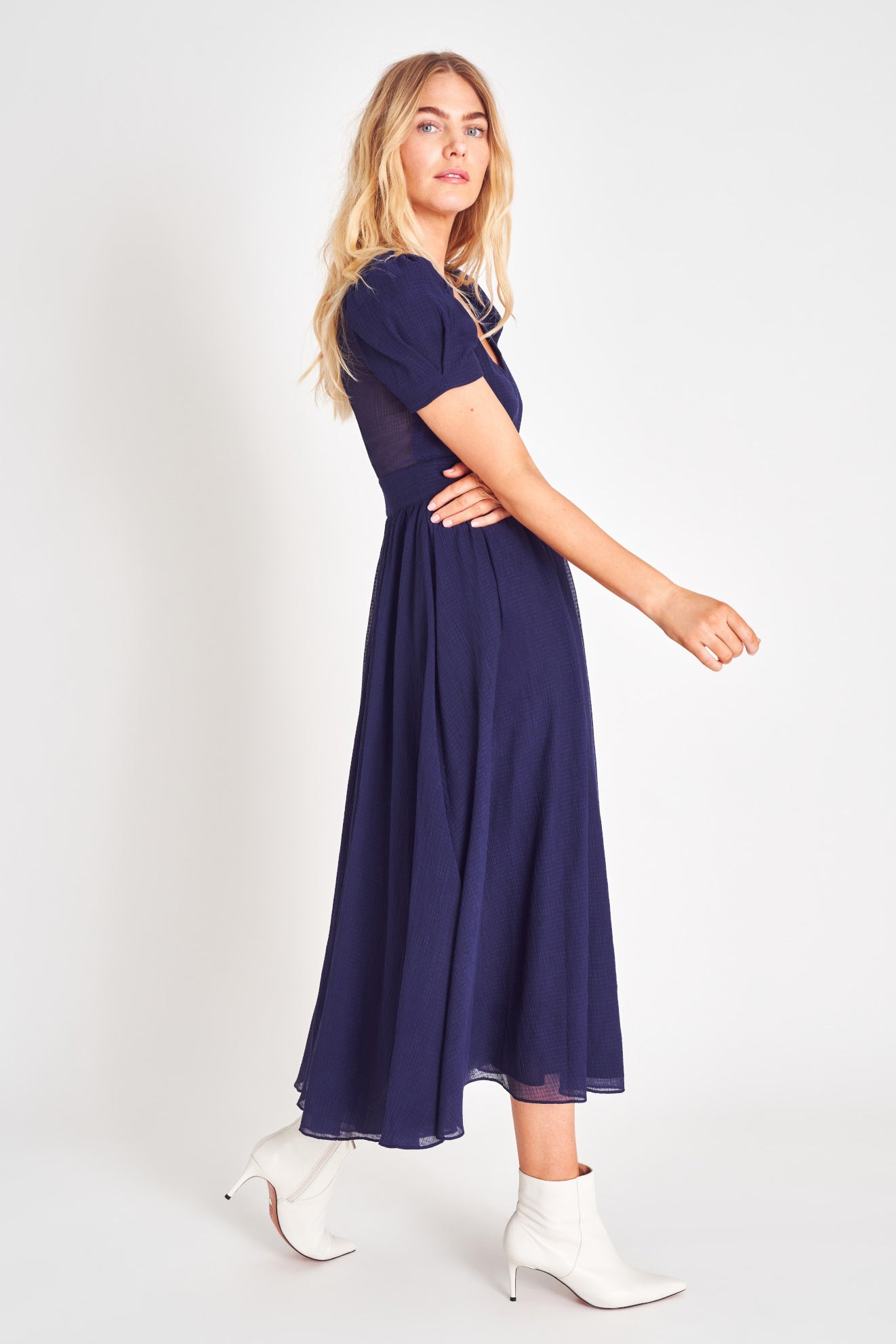Puff sleeve v neck midi dress with fitted waist.