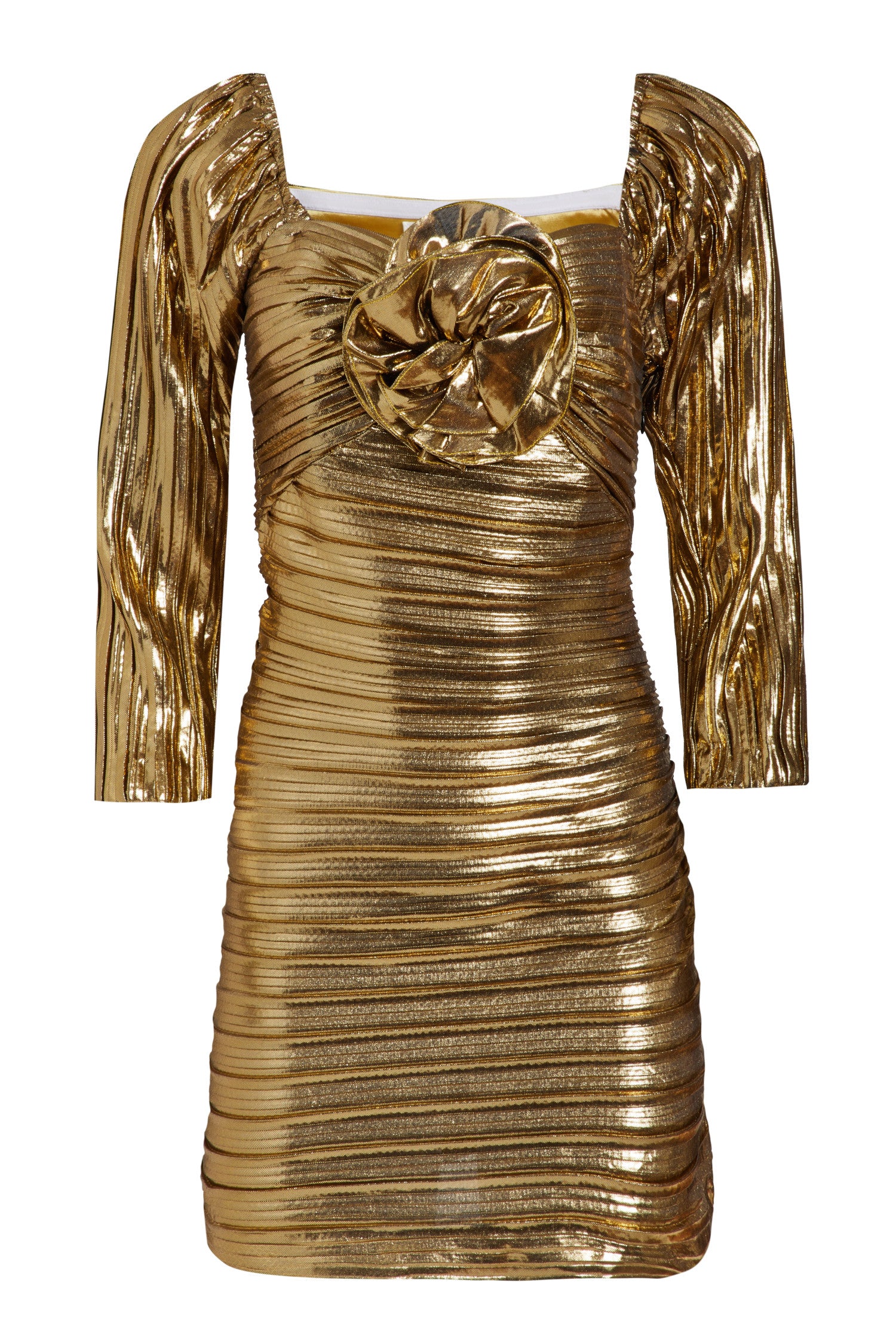 Mini gold pleated lame fabric dress with fixed, three-dimensional flower applique on the center front, elastic straps at the shoulders allowing for comfortable wear, and a lined bodice. 