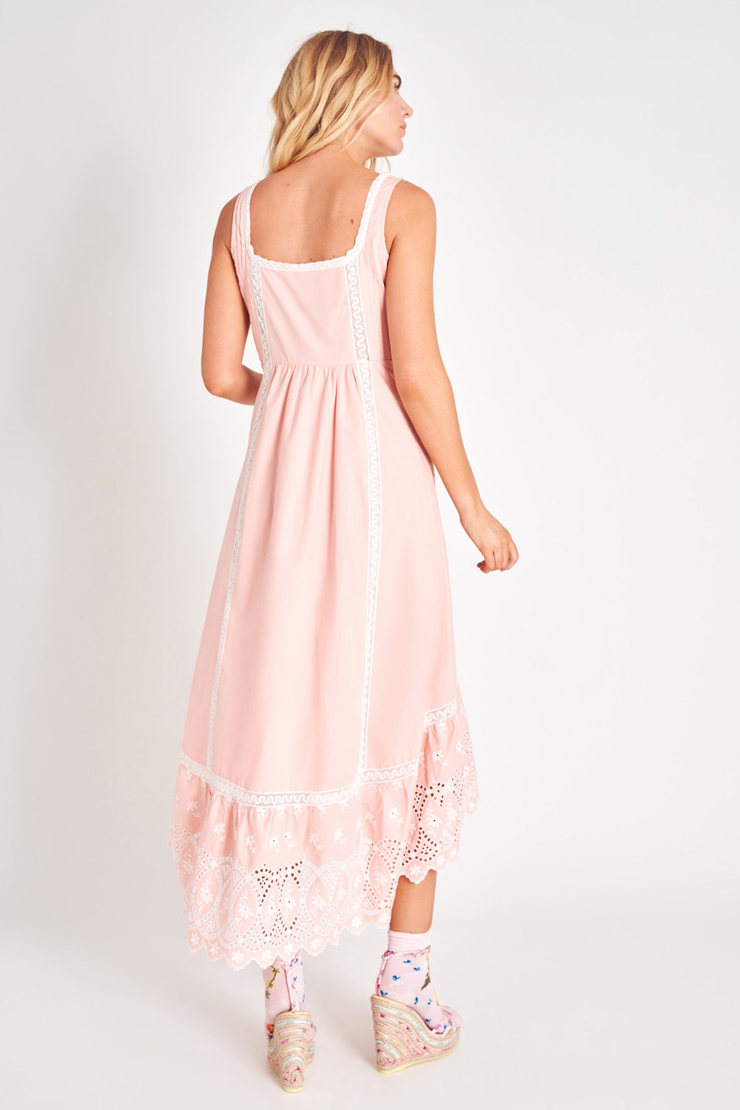 Pink high to low midi with embroidery detail.