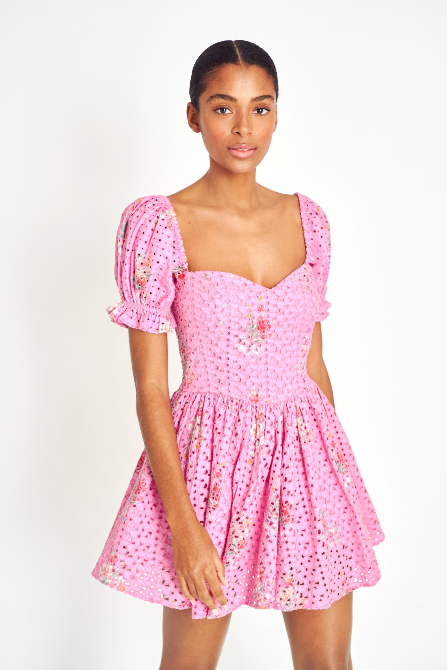 Pink lace mini dress with floral detailing 
