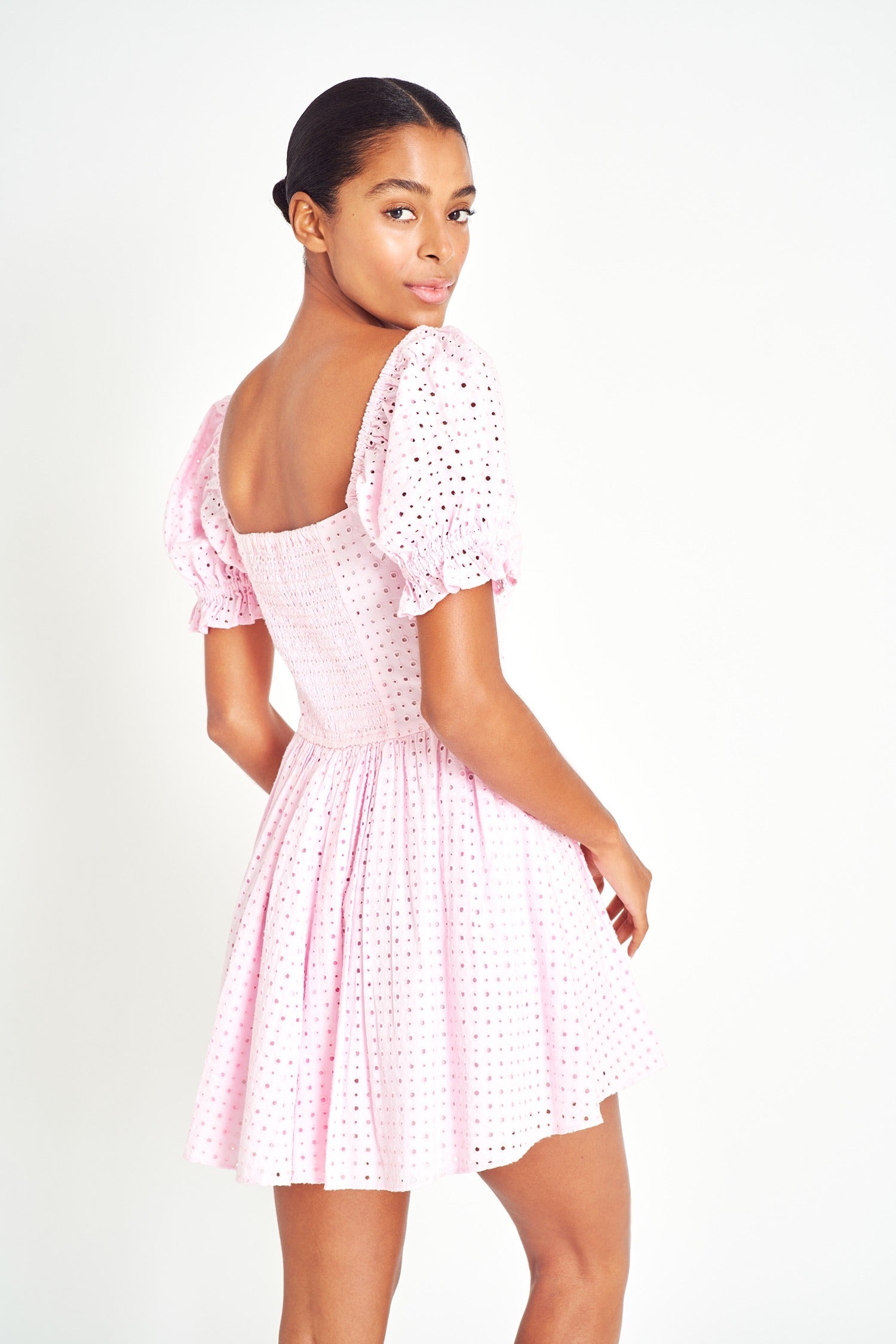 Pink eyelet dress with short puff sleeves