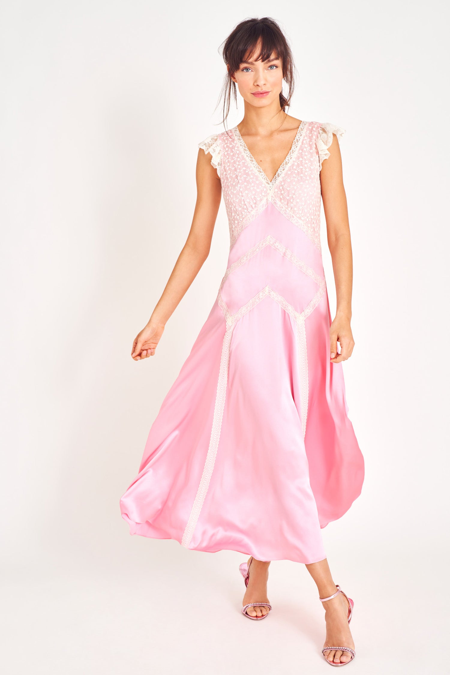 Pink silk v neck maxi dress with lace, embroidery, tulle insets.