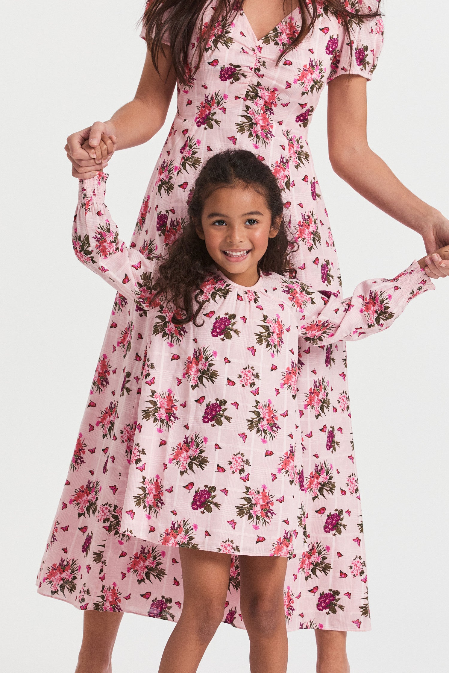 Girls floral pink print dress with long-sleeves.