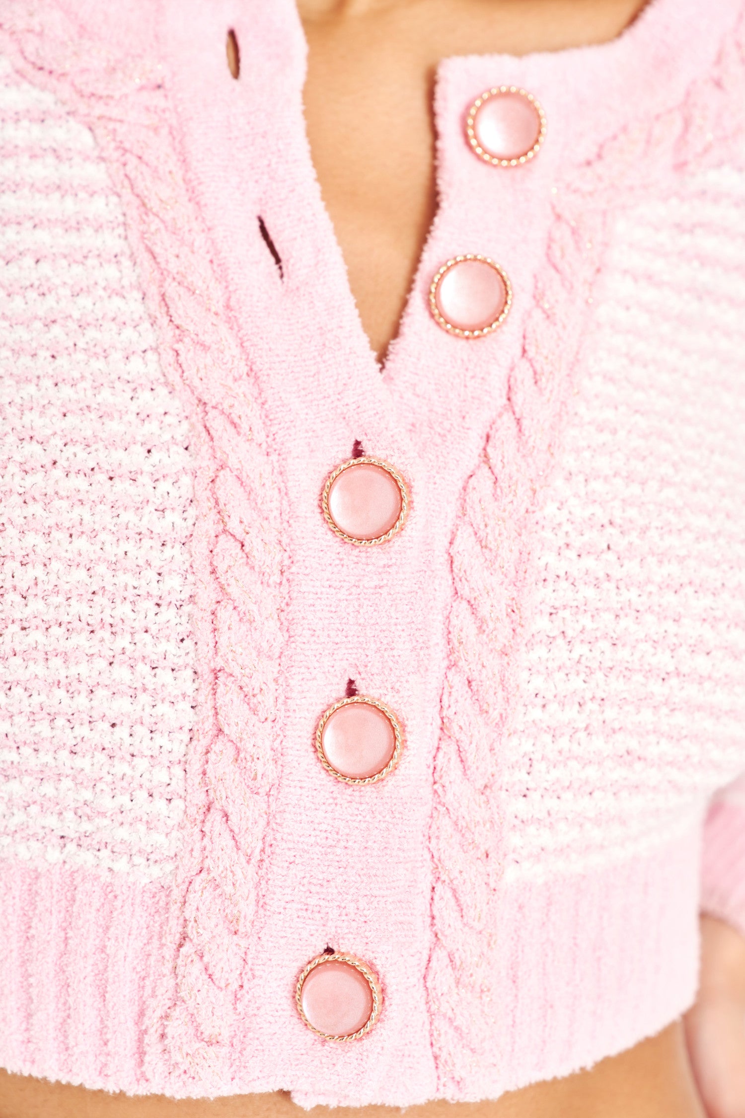 Pink tweed cropped cardigan.