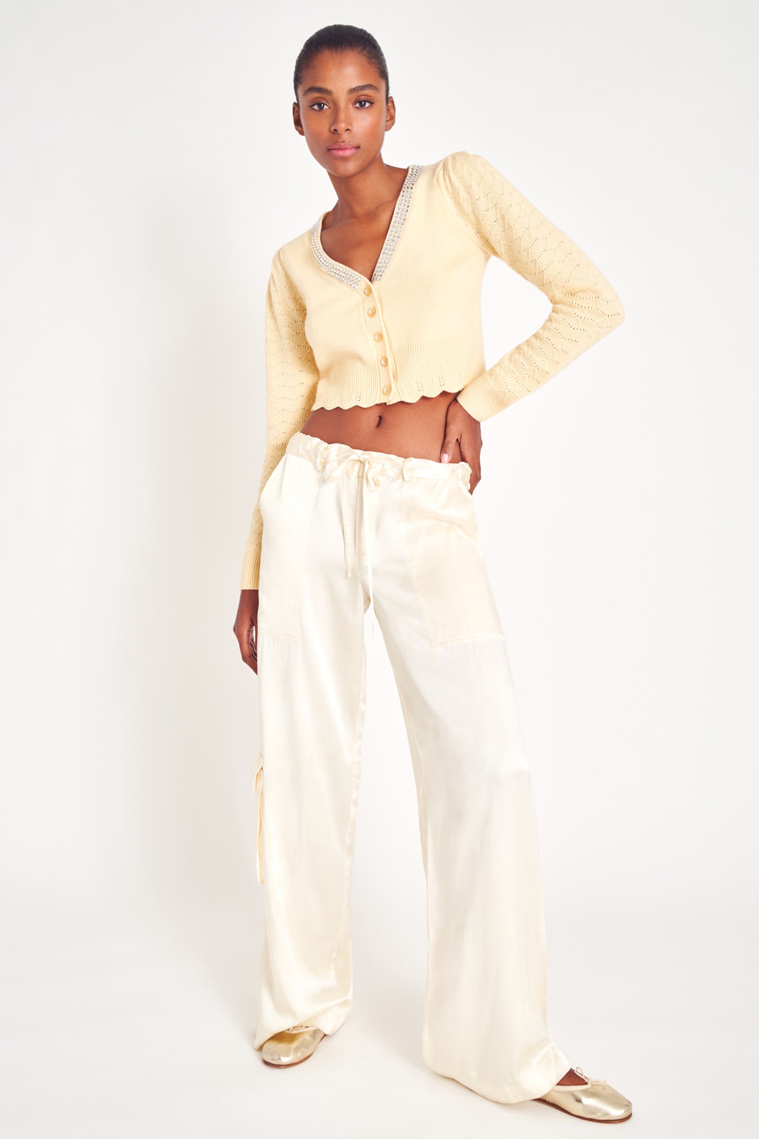 White silky charmeuse cargo pants with deep pockets.