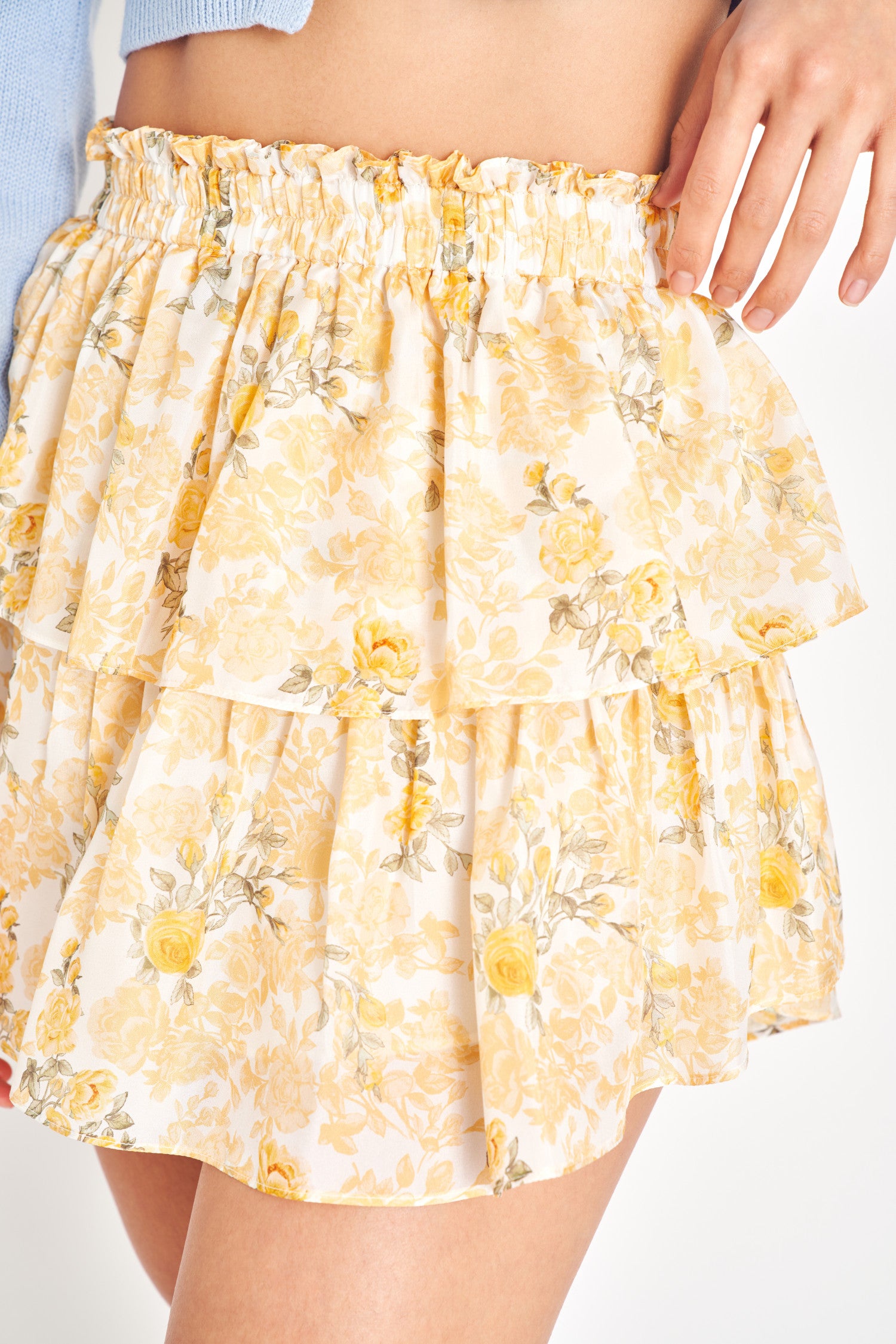 Yellow floral ruffle mini skirt.