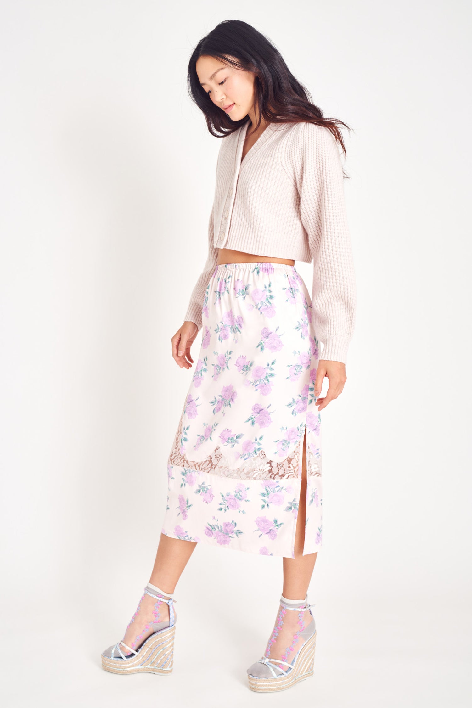 Purple floral midi skirt with lace insets.