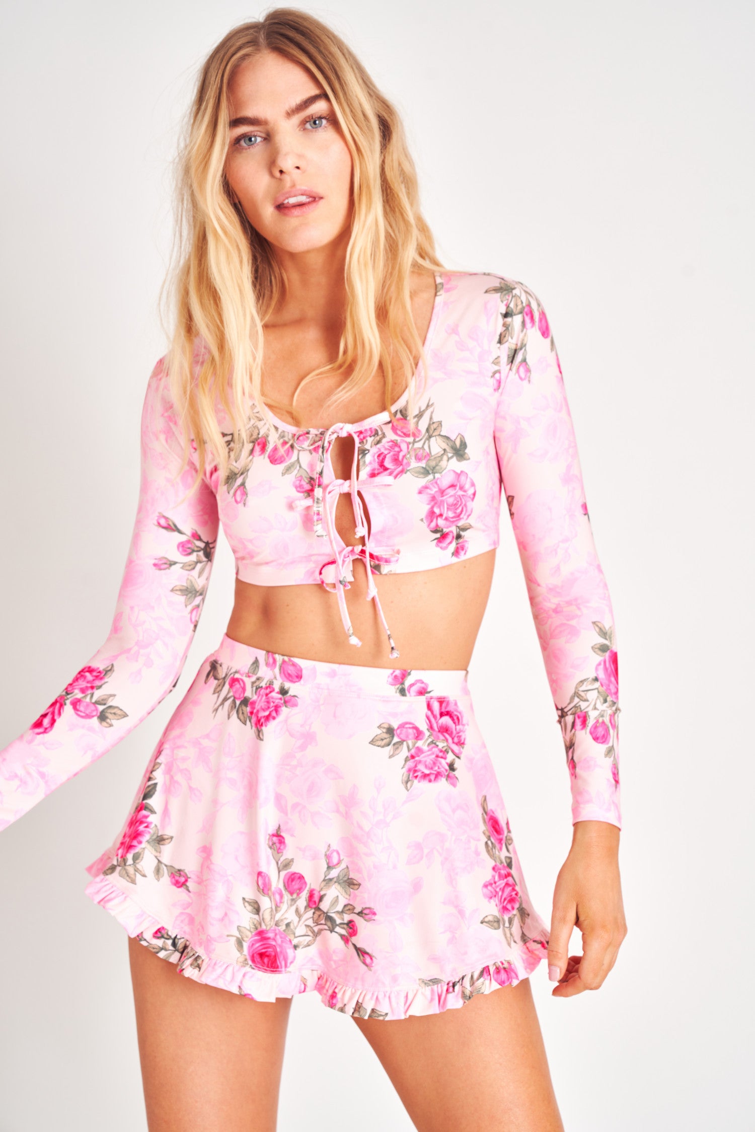 Pink floral long sleeve tie keyhole cropped top.